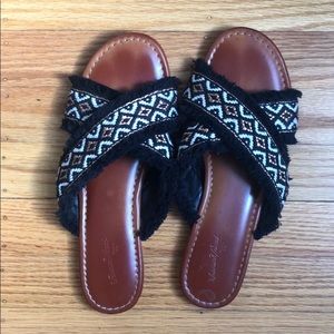 Black sandals with fringe